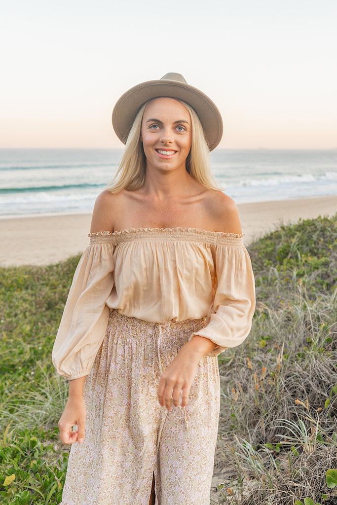 Nude off the shoulder blouse